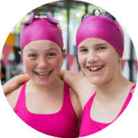 Two girls in pink swimwear