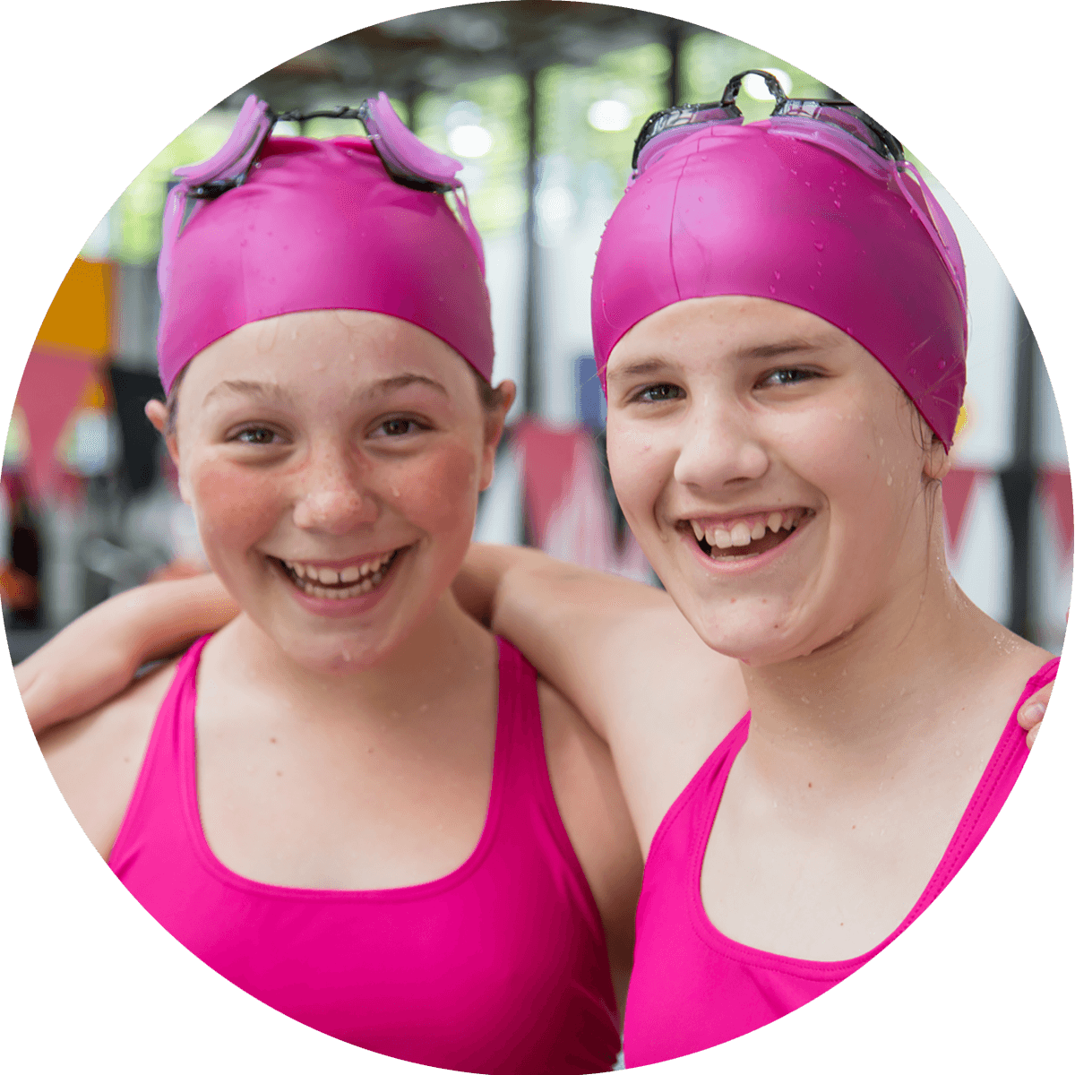 Two girls in pink swimwear